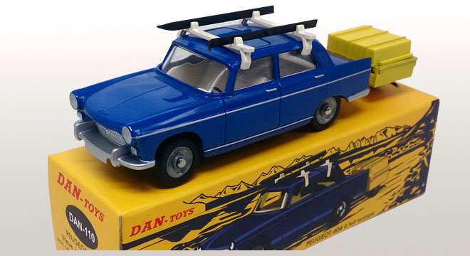 Peugeot 404 darkblue with ski's and trailer 1:43